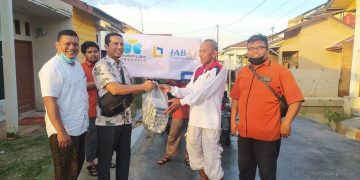JAPNAS Riau Salurkan Bantu Warga Banjir Melalui LAZISMU Pekanbaru