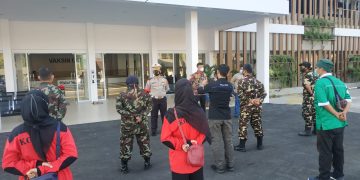 KOKAM Pemuda Muhammadiyah Riau Ikut Sukseskan Vaksinansi dari POLDA Riau