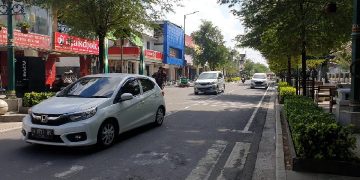 Suasana Jalan Malioboro Yogyakarta saat PPKM Level 4 pada Senin, 26 Juli 2021. Jalan Malioboro sudah bisa dilewati, namun masih lengang. TEMPO | Pribadi Wicaksono