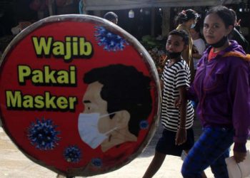 Kemenkes: Hati-Hati Buka Masker untuk Foto Bersama