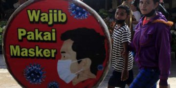 Kemenkes: Hati-Hati Buka Masker untuk Foto Bersama