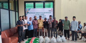 LAZISMU Sumatera Selatan Bantu Tukang Becak, Buruh Panggul dan Pedagang Jamu Gendong