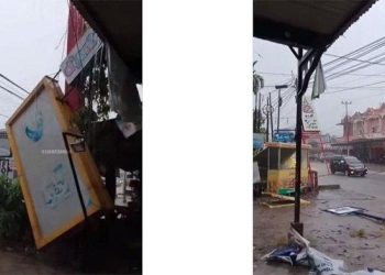 Hujan Lebat Disertai Angin Kencang, Beberapa Tiang Reklame di Jalan Paus Pekanbaru Patah