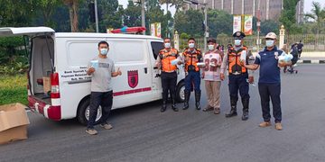 Relawan Rakyat Bahagia Bagikan 4.000 Masker Gratis di Car Free Day Pekanbaru