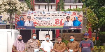 Pekanbaru Diselimuti Asap, Anak-anak Terancam! Relawan Rakyat Bahagia Bergerak Bagikan Masker Gratis