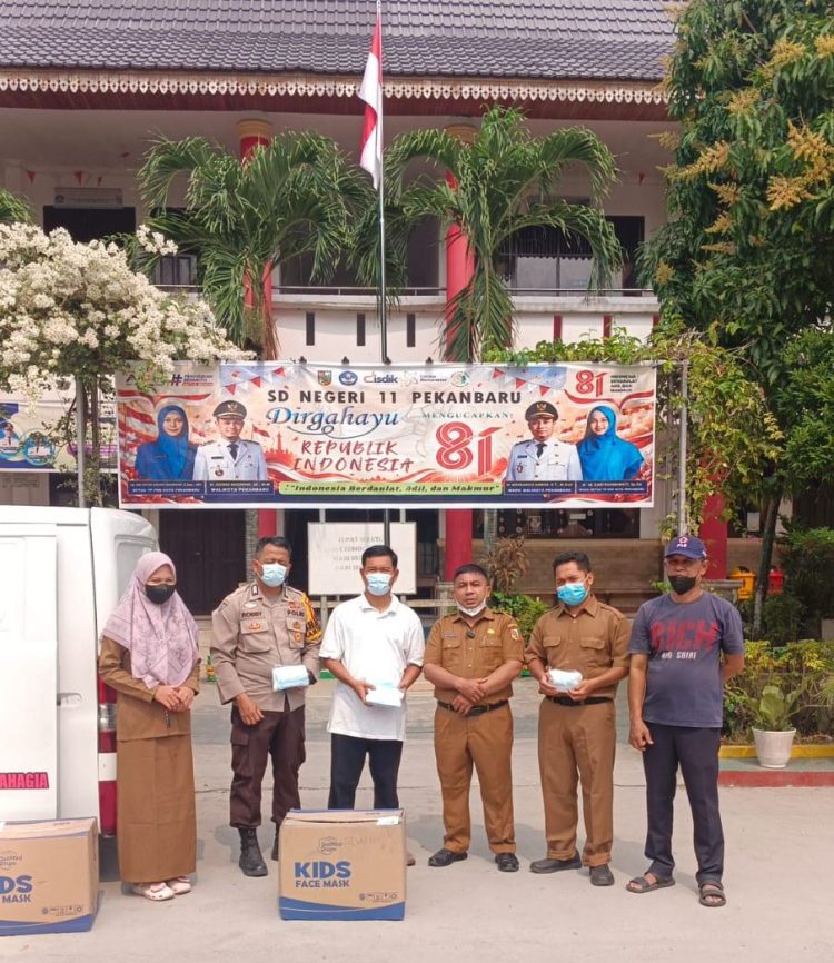Pekanbaru Diselimuti Asap, Anak-anak Terancam! Relawan Rakyat Bahagia Bergerak Bagikan Masker Gratis